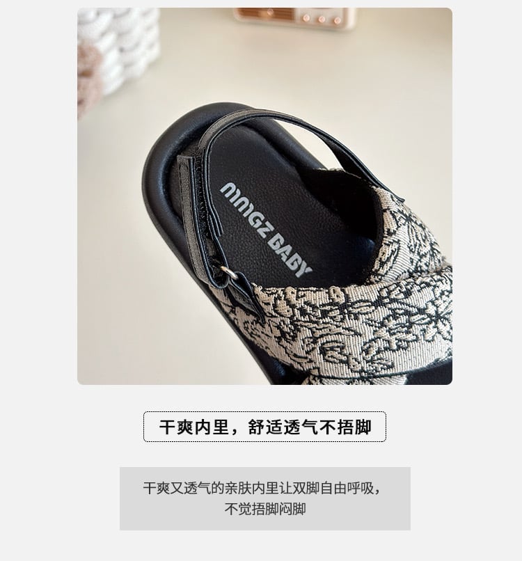 V1026 - Sandal MGbaby quai chéo 2 màu đen, trắng hoa bé gái size 21-30