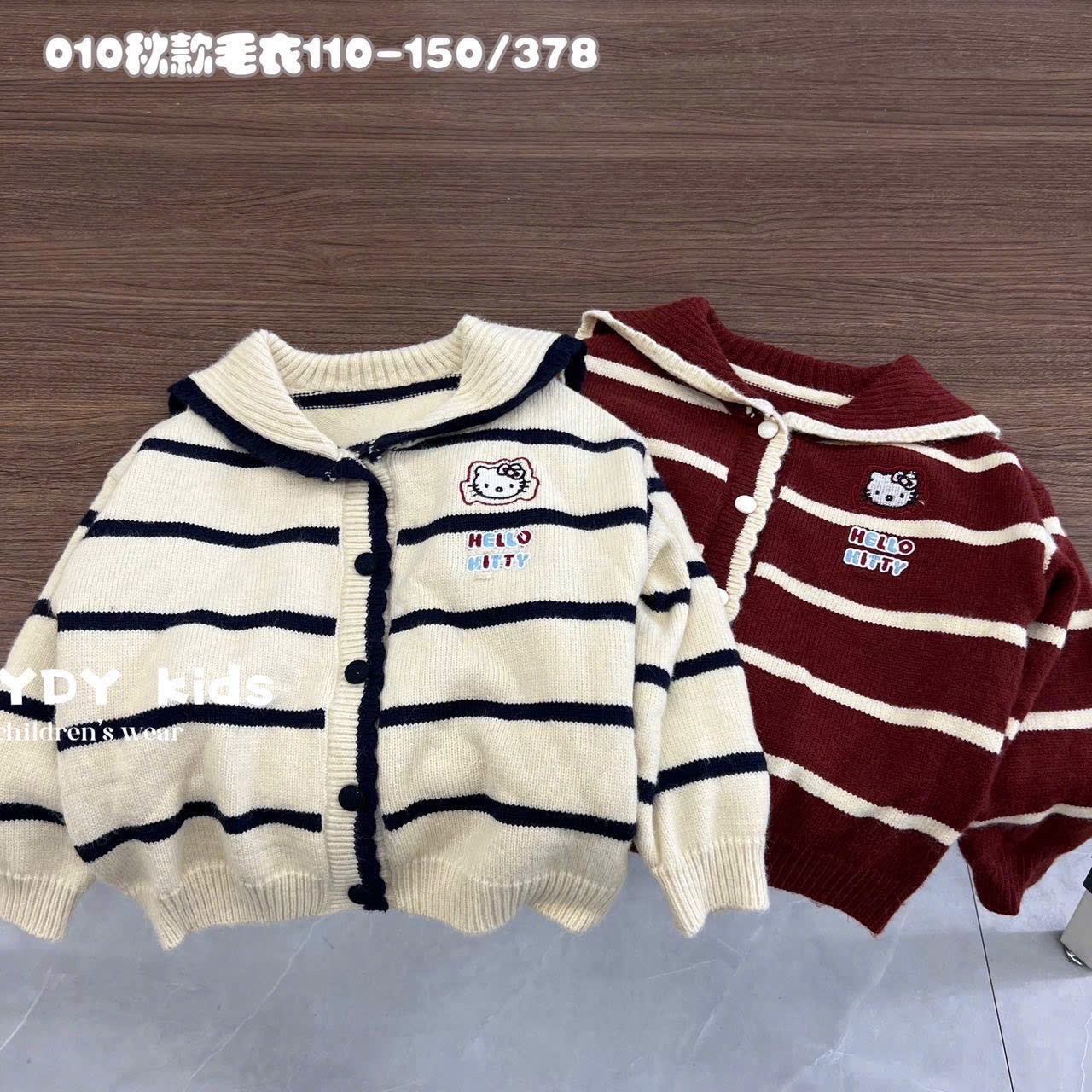 Cardigan len cổ bẻ QC kẻ kitty  2 màu đỏ/be size 110-150