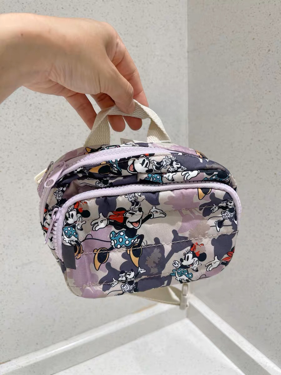 Túi bao tử Zara tím minnie