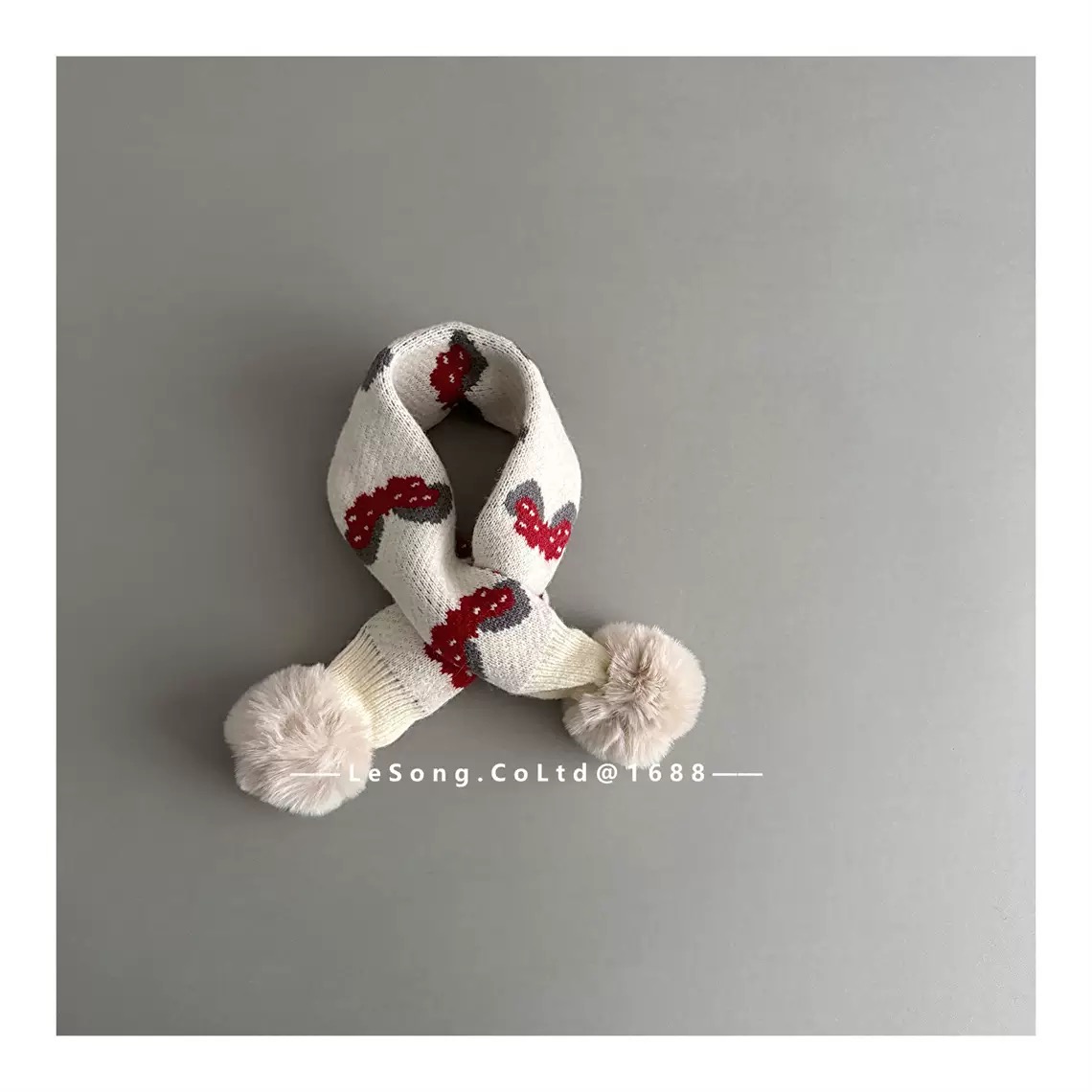 Khăn len quàng chéo đính cục bông nhiều màu noel cho bé