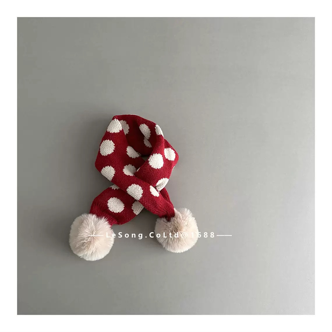 Khăn len quàng chéo đính cục bông nhiều màu noel cho bé