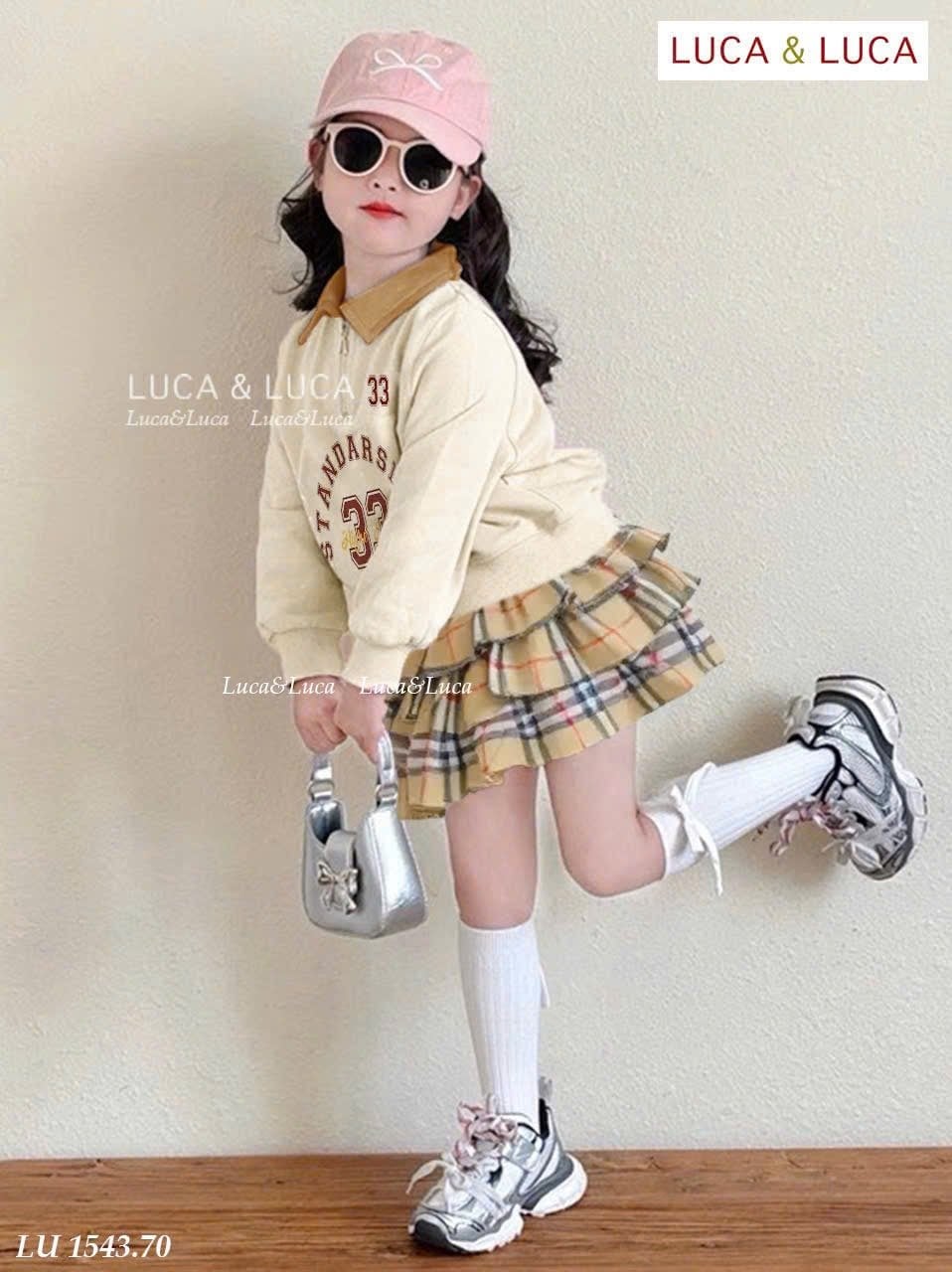 LU 1543 - Bộ LUCA áo be cổ đức + chân váy kẻ BBR liền quần bé gái size 2-12y