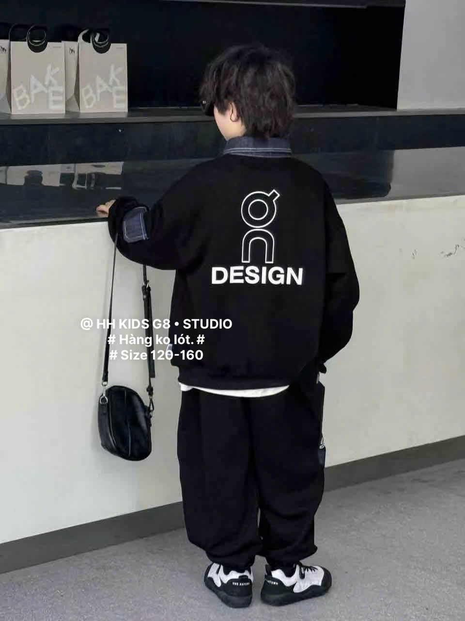 D312 - Bộ nỉ hai da cổ đức tay phối hai màu đen/be bé trai size 120-160