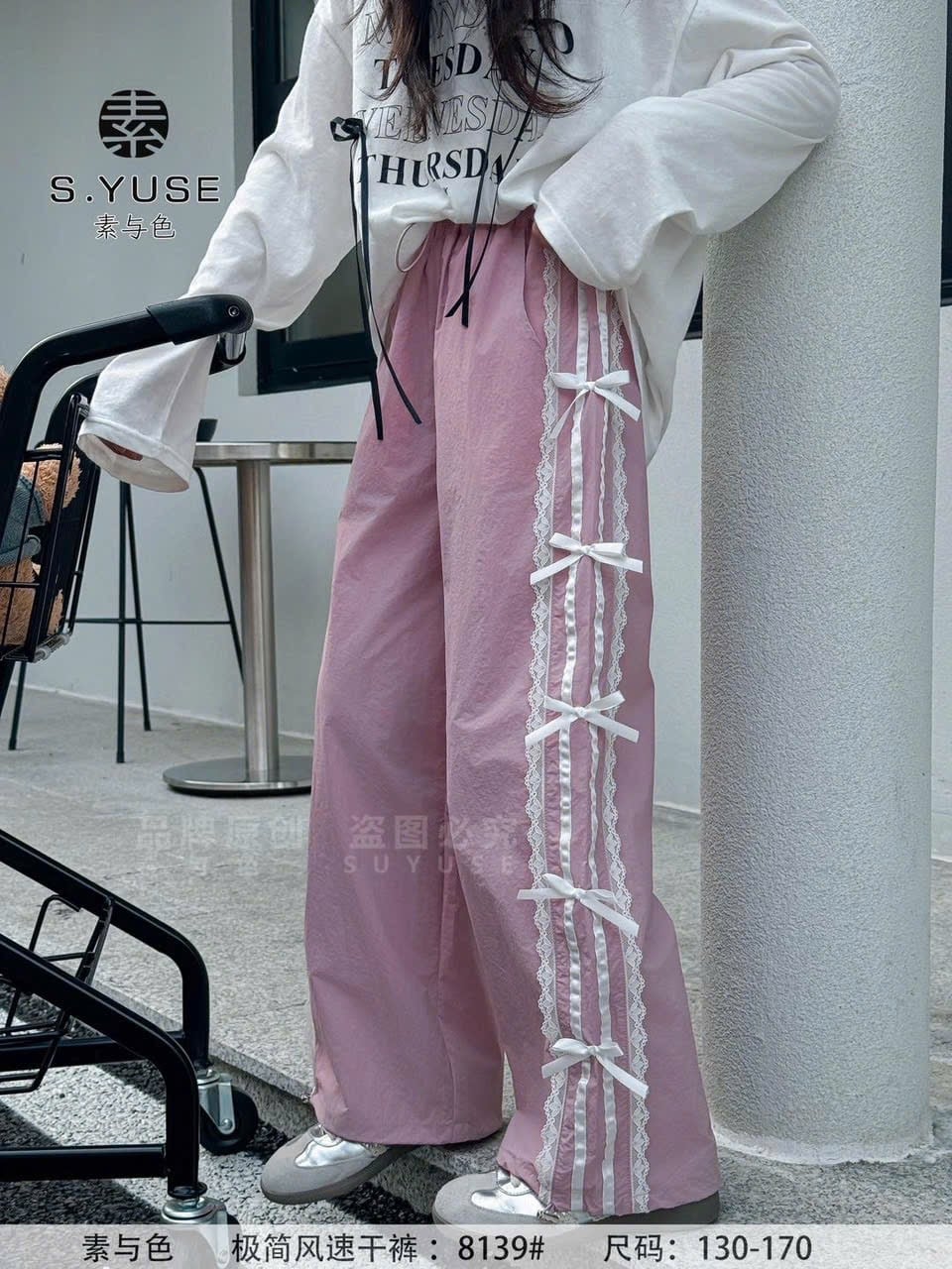 SYS8139 - Quần gió sọc ren nơ màu hồng cho bé size 130-170