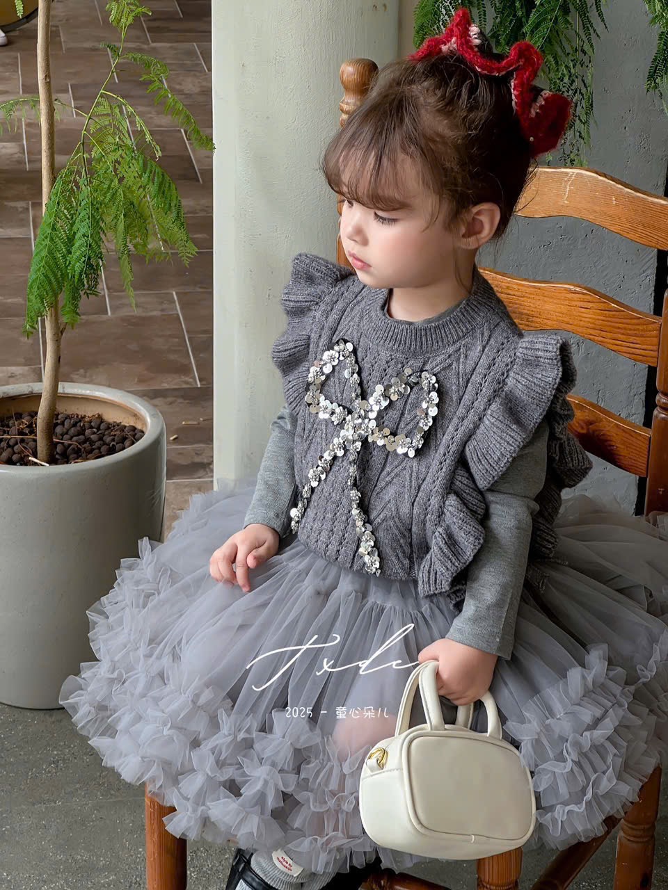 W25201 - Set 2ct áo gile len ghi đính nơ + váy ghi bé gái size 90-130