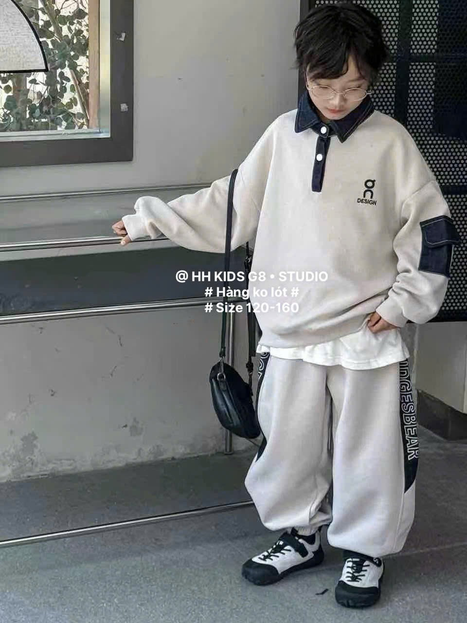 D312 - Bộ nỉ hai da cổ đức tay phối hai màu đen/be bé trai size 120-160