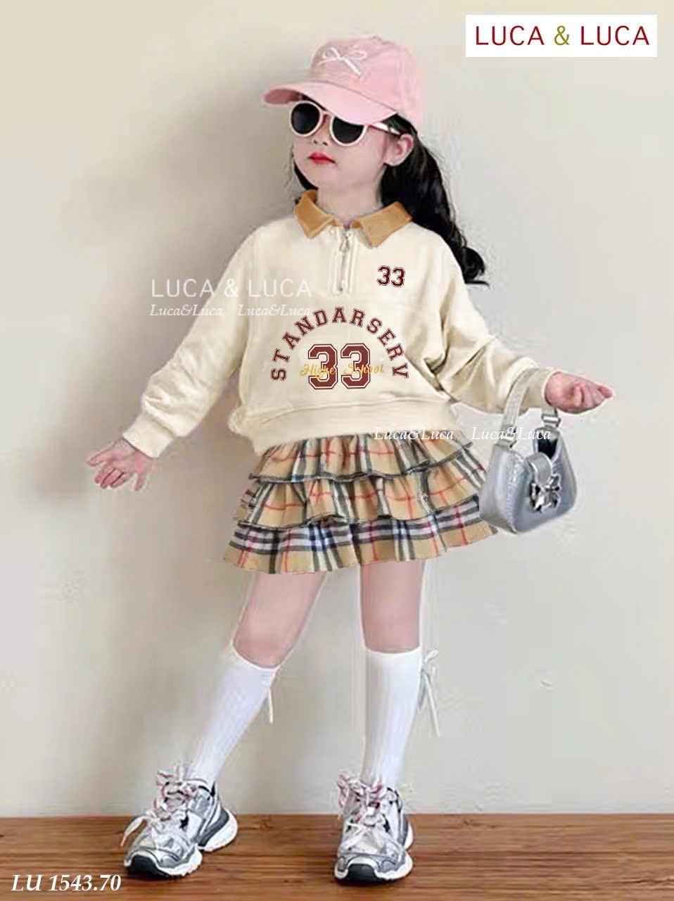 LU 1543 - Bộ LUCA áo be cổ đức + chân váy kẻ BBR liền quần bé gái size 2-12y