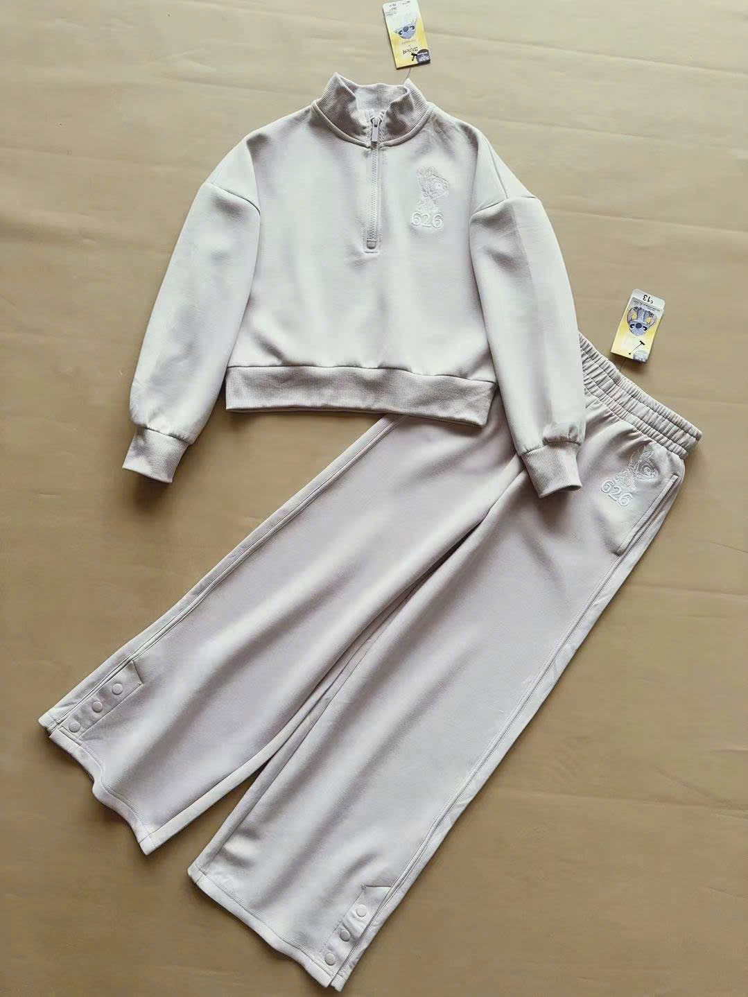 Bộ nỉ thể thao Pri.mark màu tím lilac Stitch cho bé gái size 7-15y