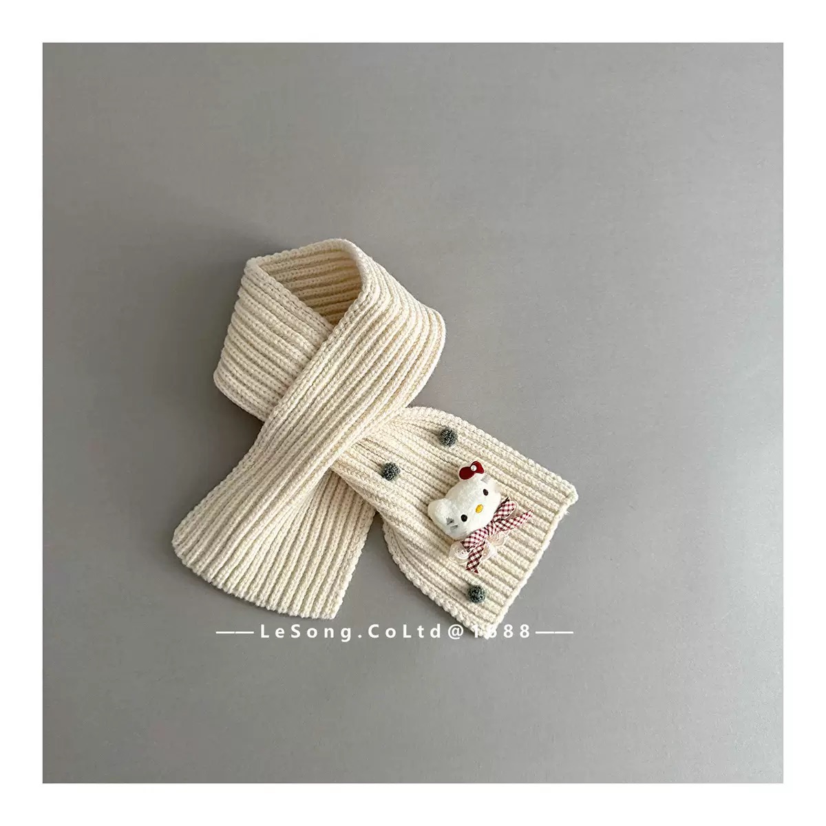 Khăn len quàng chéo đính Kitty nhiều màu cho bé gái