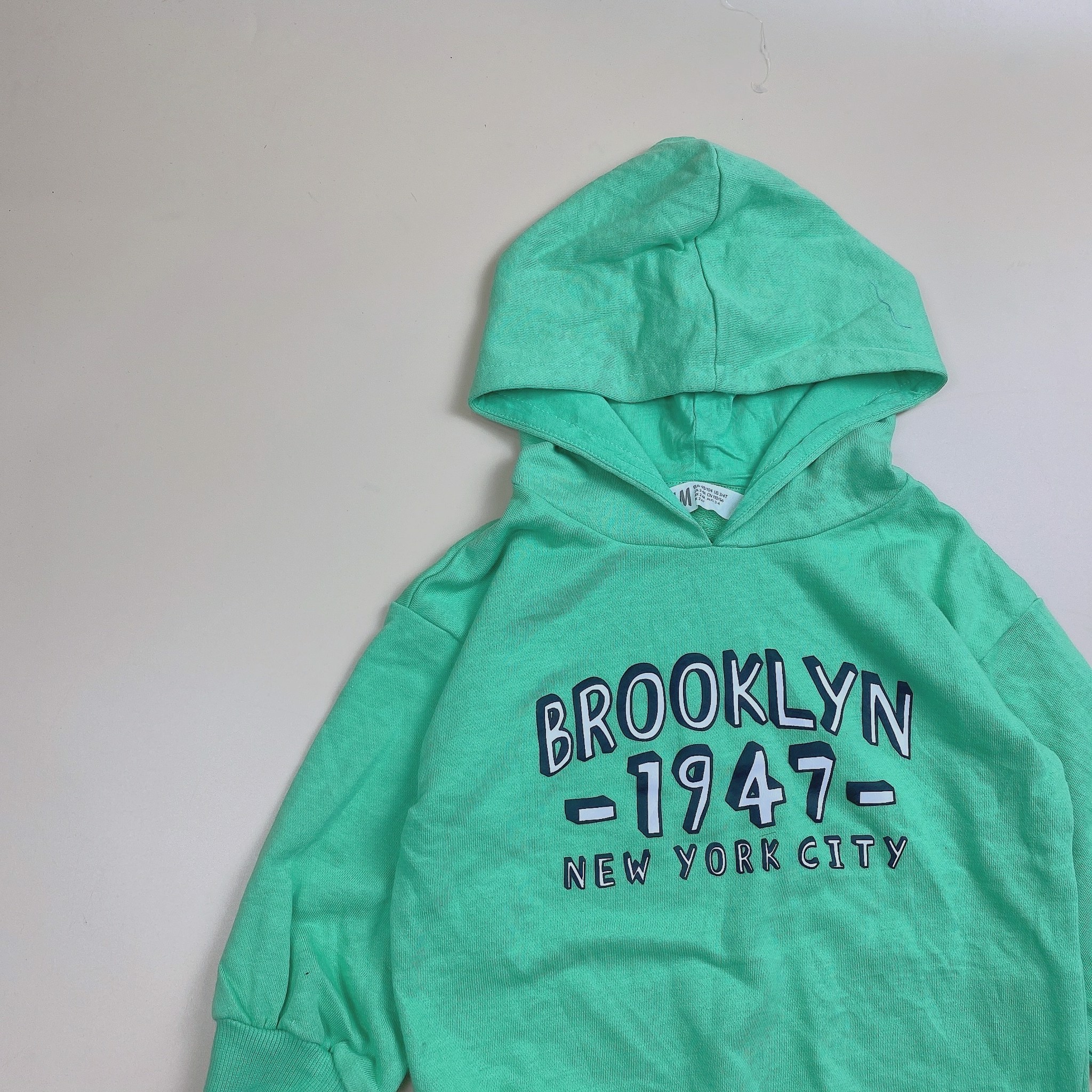 Áo nỉ da cá hoodie HM màu xanh in chữ Brooklyn 1947
