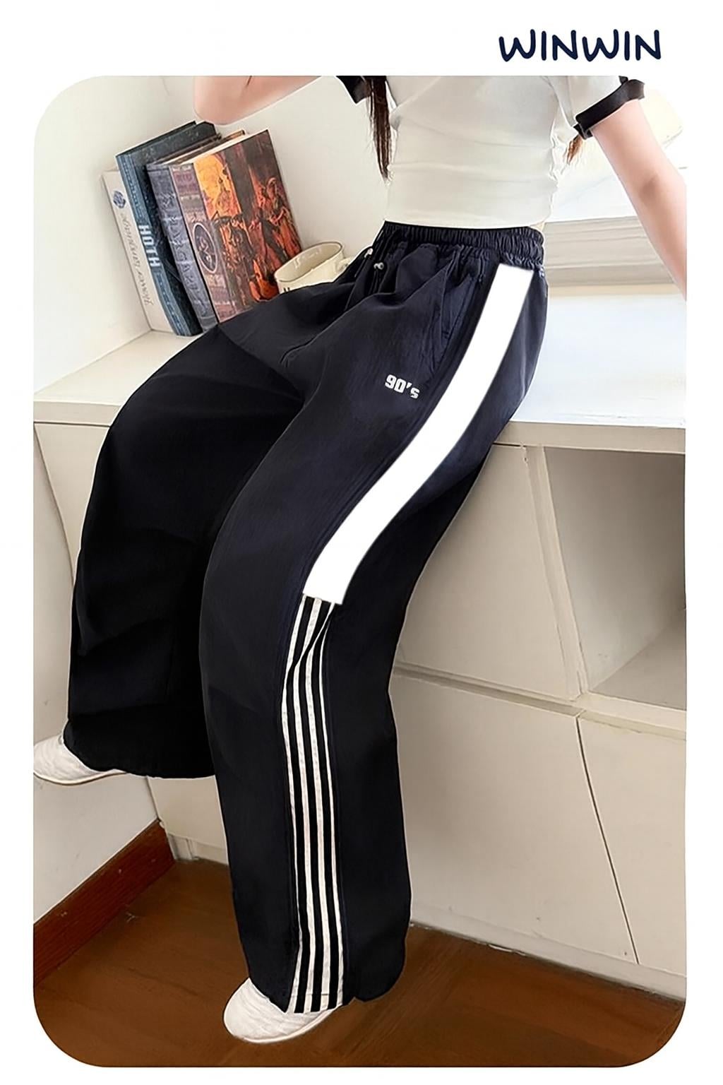 Quần gió WinWin ống suông viền sọc hông bé gái size 6-15y