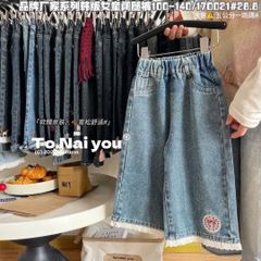 Quần jean QC ống suông gấu ren thêu nơ đỏ bé gái size 90-130