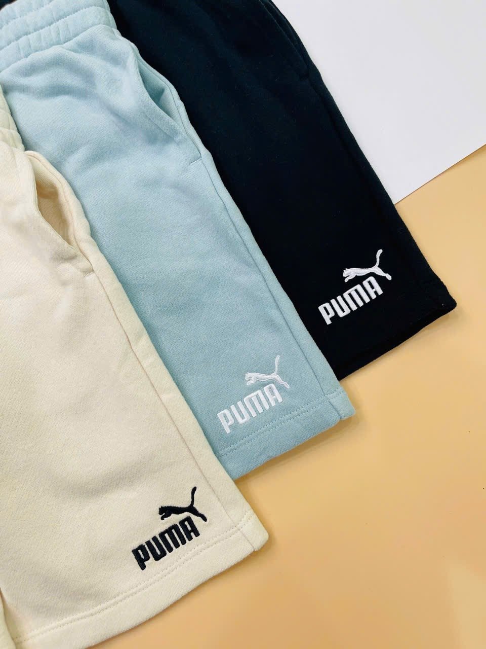 Quần short da cá P.u.m.a dư xịn trơn 3 màu cho bé size 2-16y