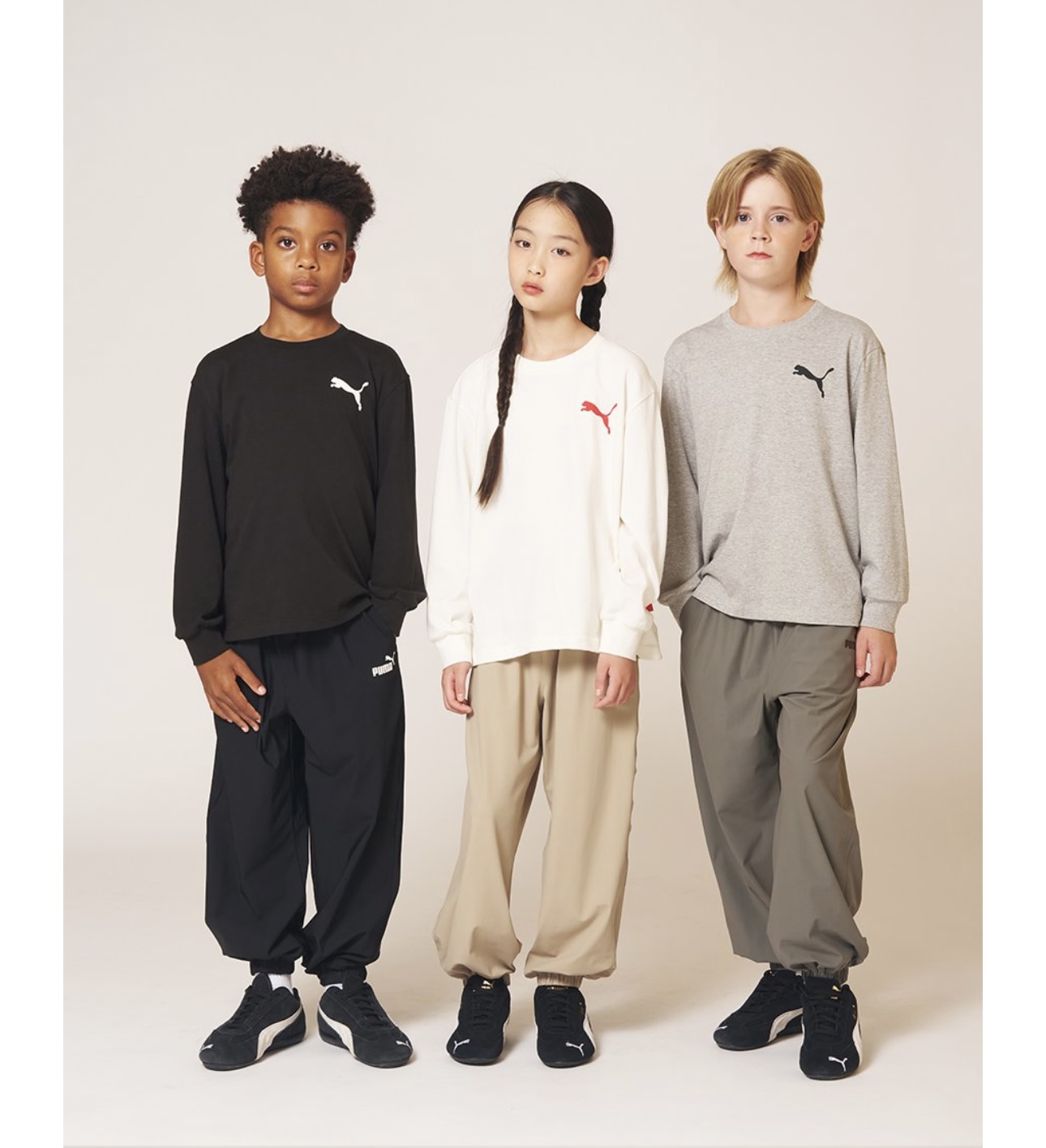 Mẫu 2 - Quần gió jogger PM xuất Hàn màu đen cho bé size 120-160