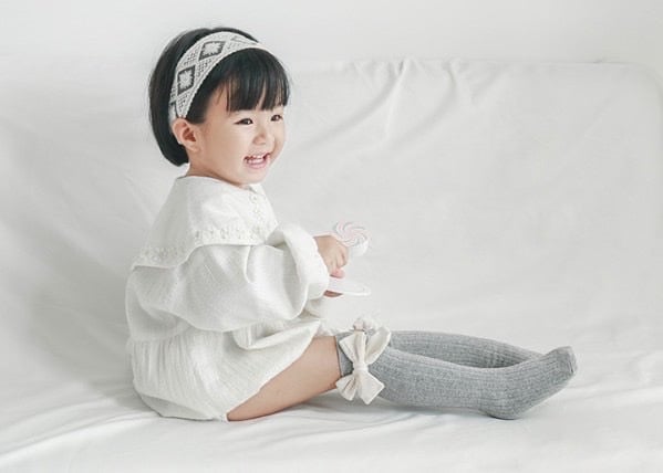 Tất cao cổ đính nơ bé gái Nemo 5 màu