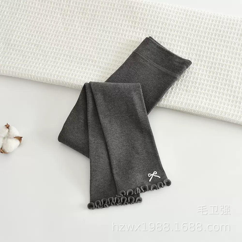 Quần len không bàn đính nơ gấu cho bé gái size 90-135cm