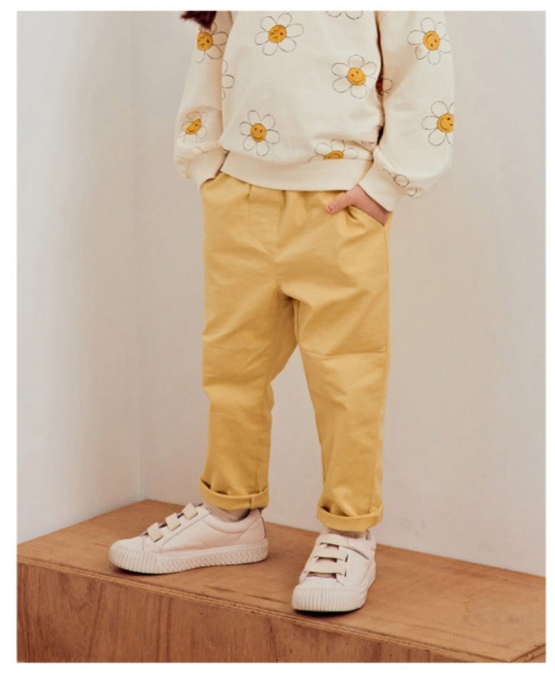 Quần kaki mềm cạp chun Toto Heros màu vàng trơn size 100 - 150