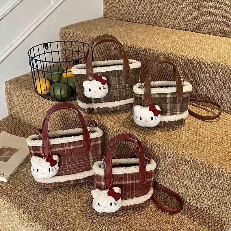 Túi xách tay đeo chéo da lộn kẻ caro charm kitty 2 màu cho bé