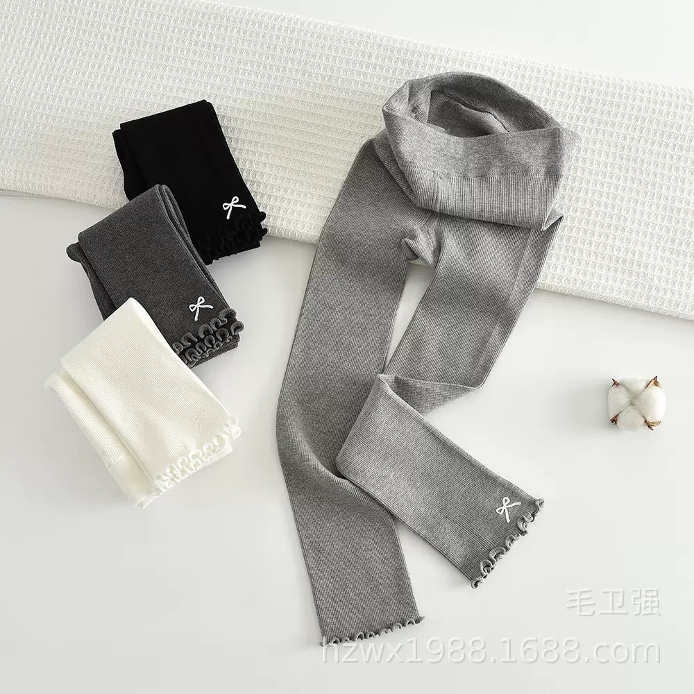 Quần len không bàn đính nơ gấu cho bé gái size 90-135cm