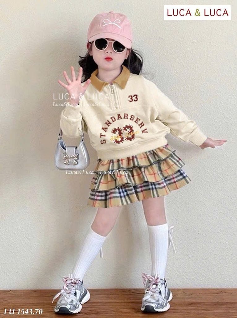LU 1543 - Bộ LUCA áo be cổ đức + chân váy kẻ BBR liền quần bé gái size 2-12y