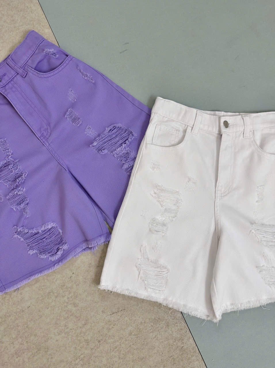 QBG31 - Quần jean rách GGJJ 2 màu trắng/tím bé gái size 8-14y