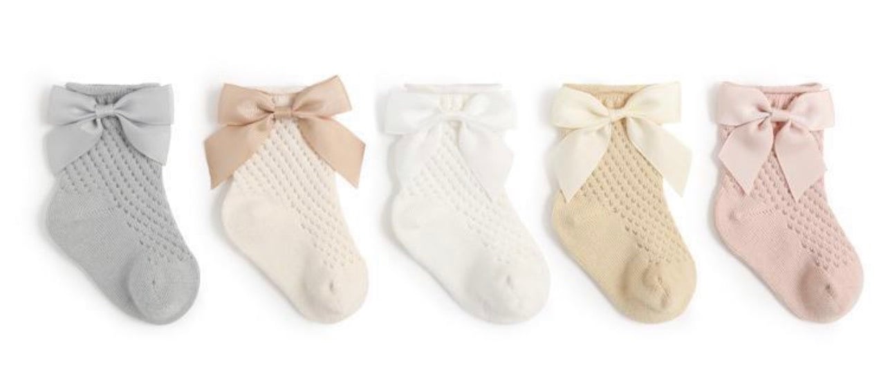 Tất lưới cao cổ Nemo baby đính nơ 5 màu trơn