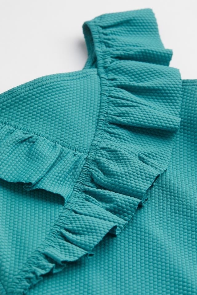 Bộ bơi HM màu xanh lá vạt chéo BG size 2 - 10y