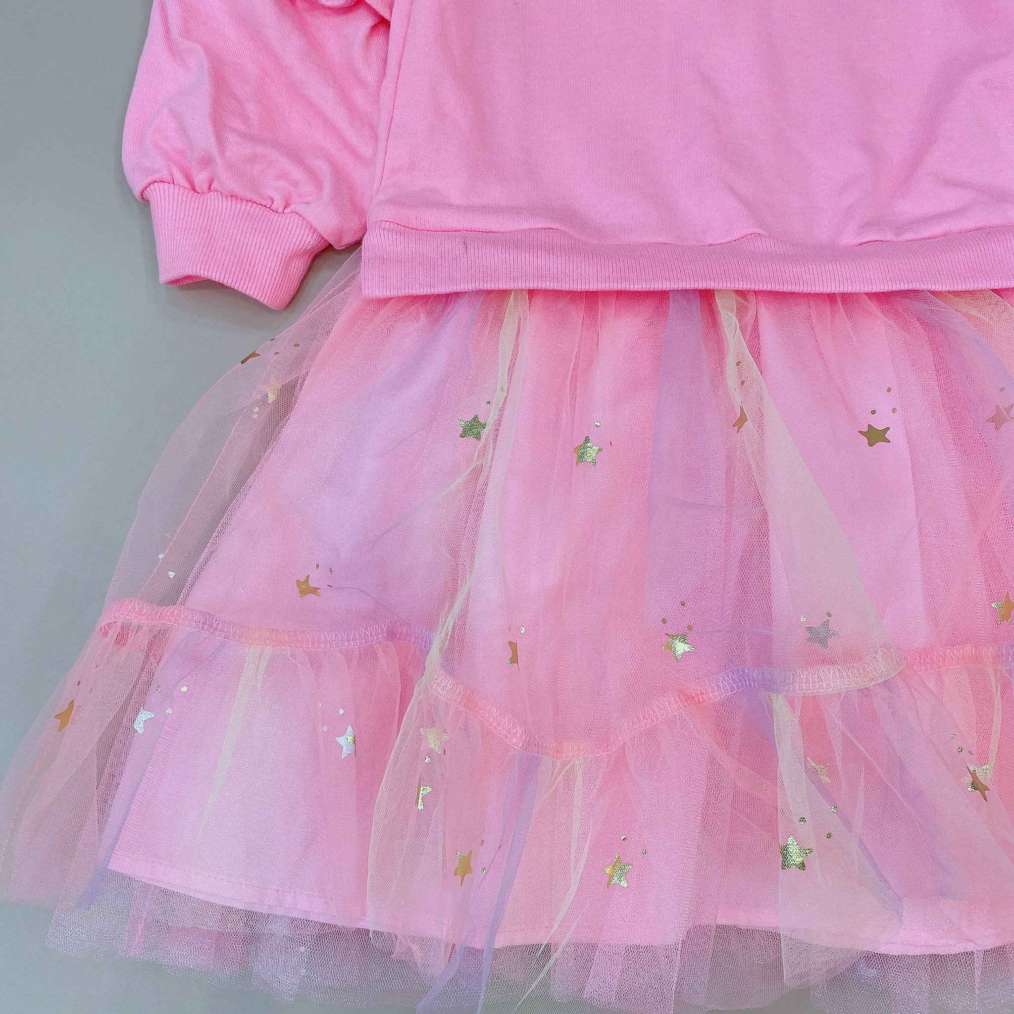 Váy nỉ da cá Bobdog màu hồng bèo vai phối chân voan sao size 110 - 140