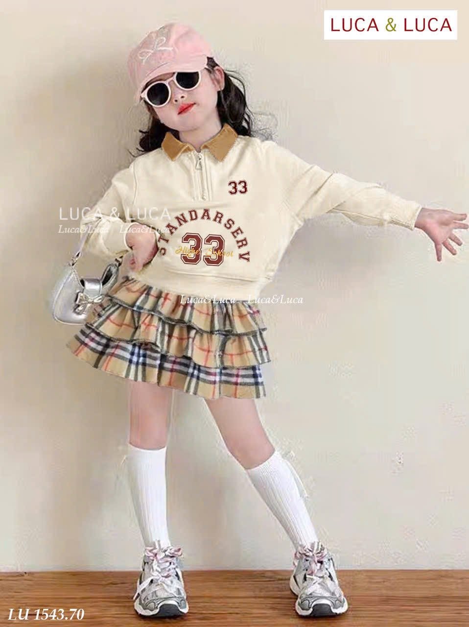 LU 1543 - Bộ LUCA áo be cổ đức + chân váy kẻ BBR liền quần bé gái size 2-12y