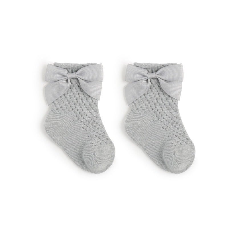 Tất lưới cao cổ Nemo baby đính nơ 5 màu trơn