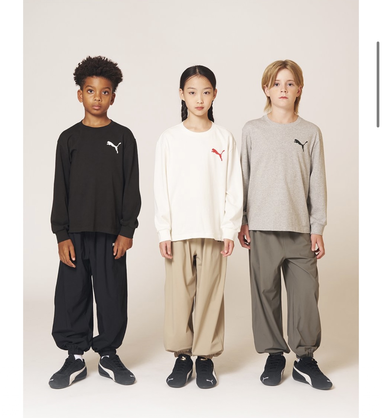 Mẫu 2 - Quần gió jogger PM xuất Hàn màu đen cho bé size 120-160