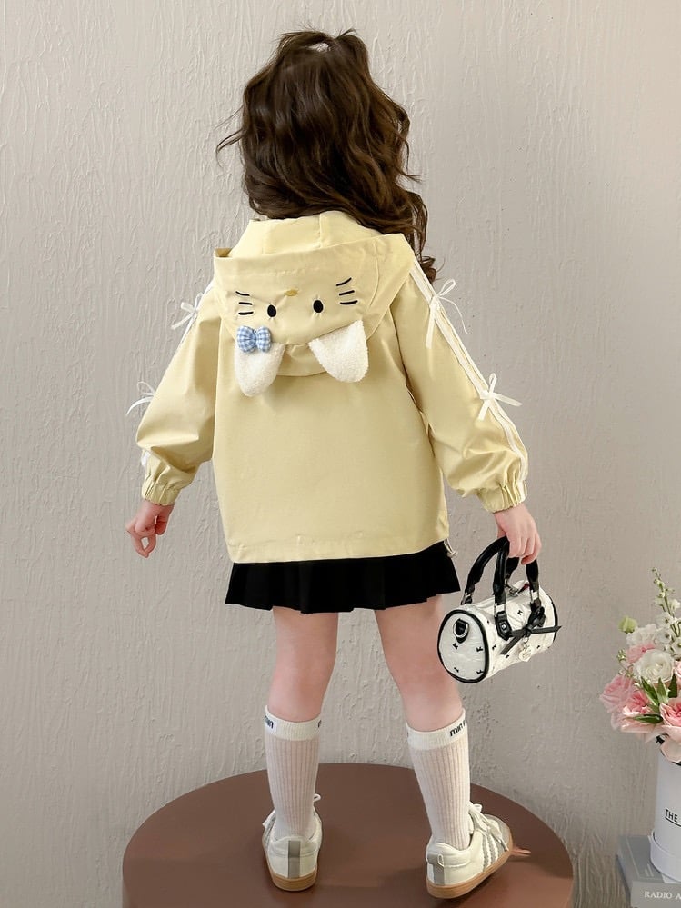 U269052 - Áo khoác gió Uceekids màu vàng kitty đính nơ bé gái size 90-130