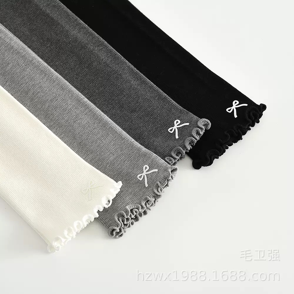 Quần len không bàn đính nơ gấu cho bé gái size 90-135cm