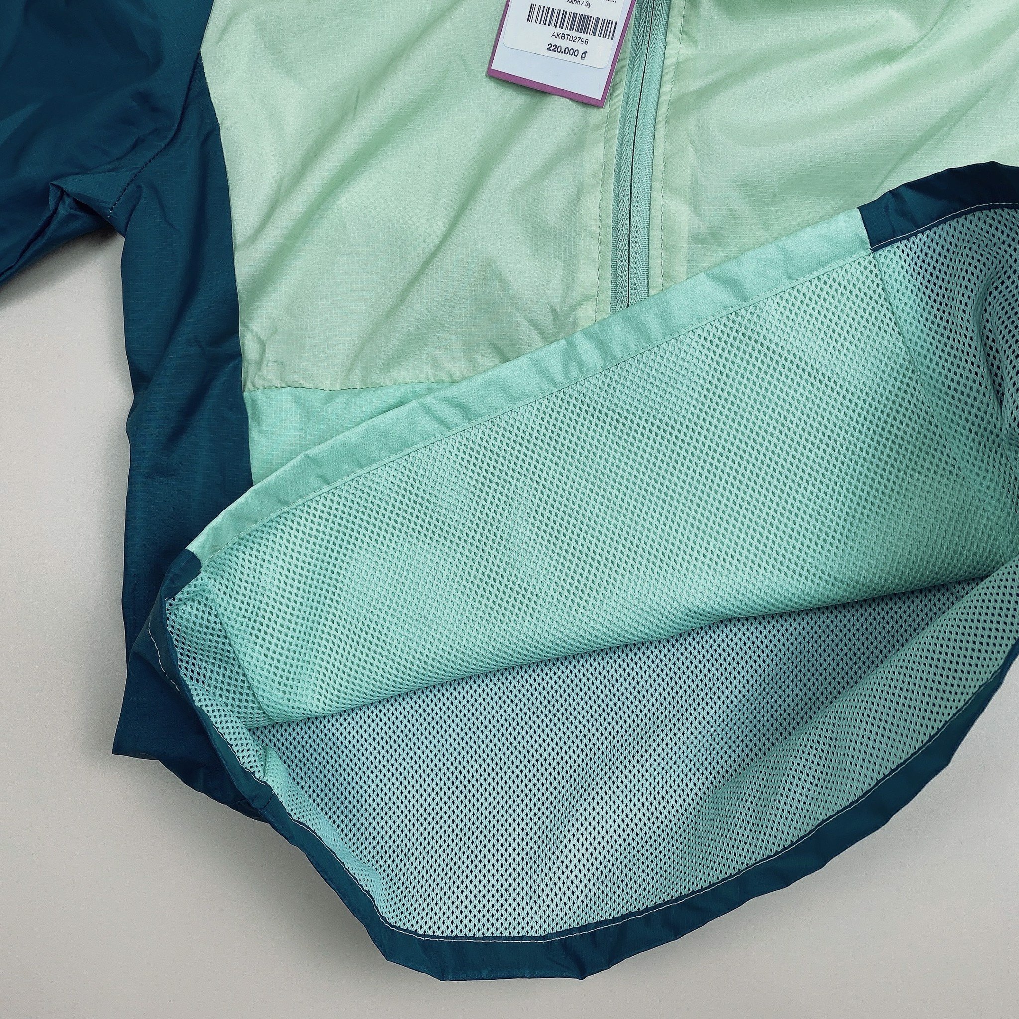 Áo khoác gió lót lưới Xersion màu xanh BT