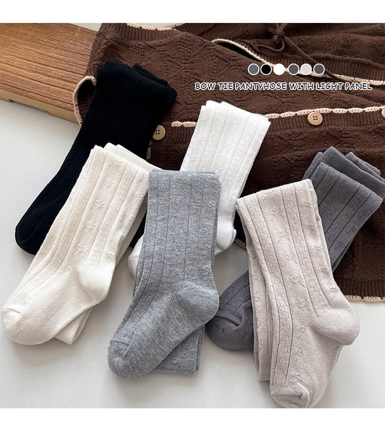 Quần tất trơn họa tiết vân nơ chìm nhiều màu cho bé size 70-140cm