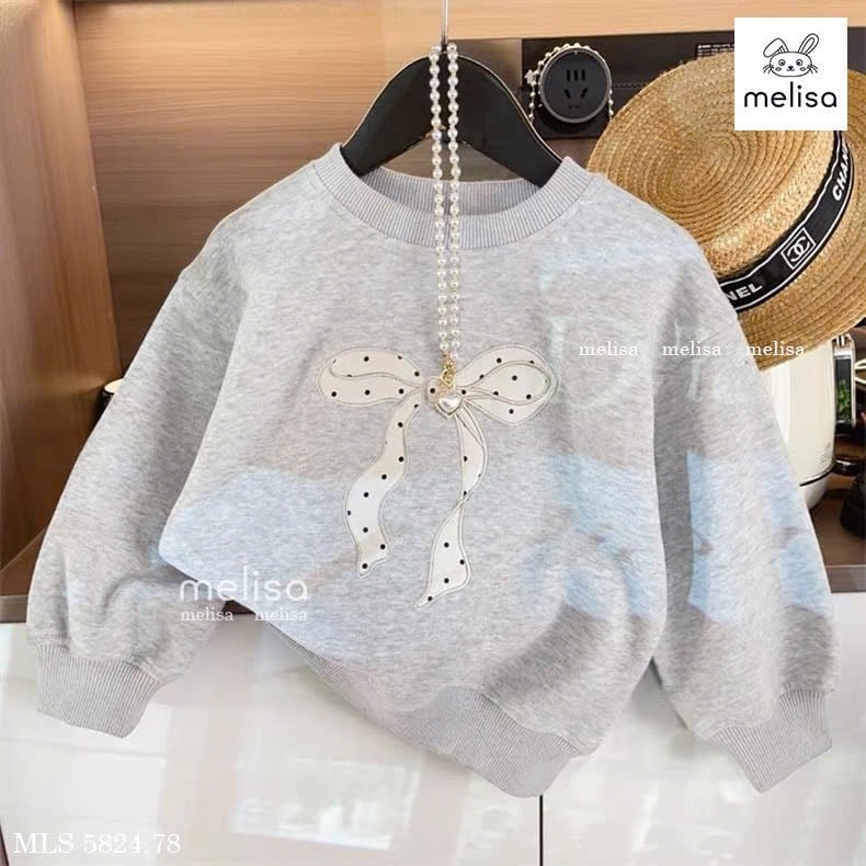 MLS 5824 - Bộ nỉ Melisa áo ghi nơ + chân váy xếp ly chấm bi bé gái size 2-12y