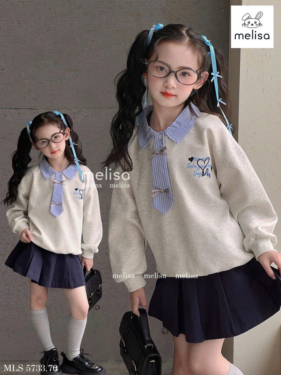 MLS 5733 - Set Melisa áo nỉ ghi xước giả cà vạt kẻ xanh - chân váy xếp li navy size 2 - 12y