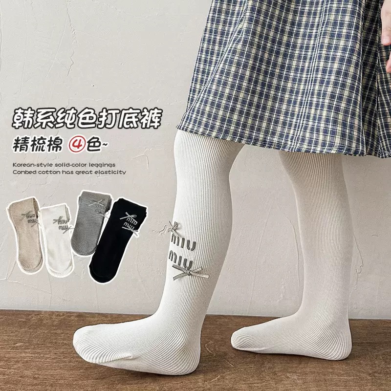 Quần tất thun tăm mùa xuân Miumiu đính nơ trơn nhiều màu cho bé size 4-12y