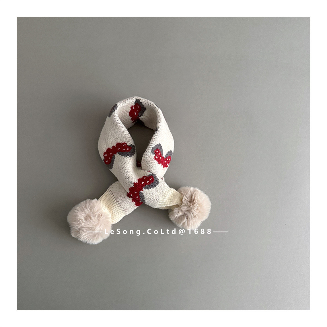 Khăn len quàng chéo đính cục bông nhiều màu noel cho bé