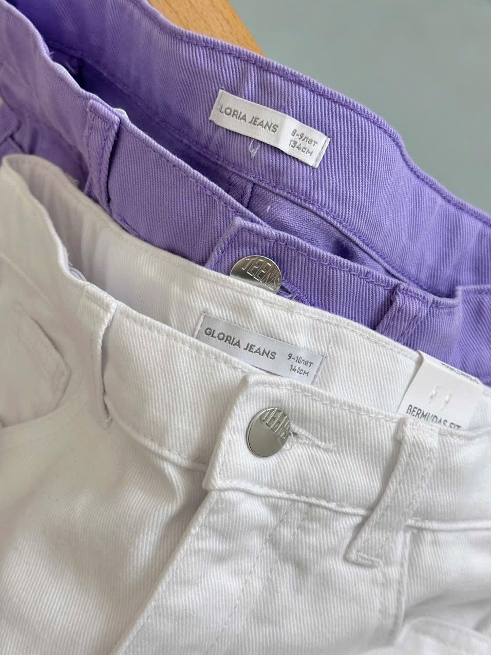 QBG31 - Quần jean rách GGJJ 2 màu trắng/tím bé gái size 8-14y