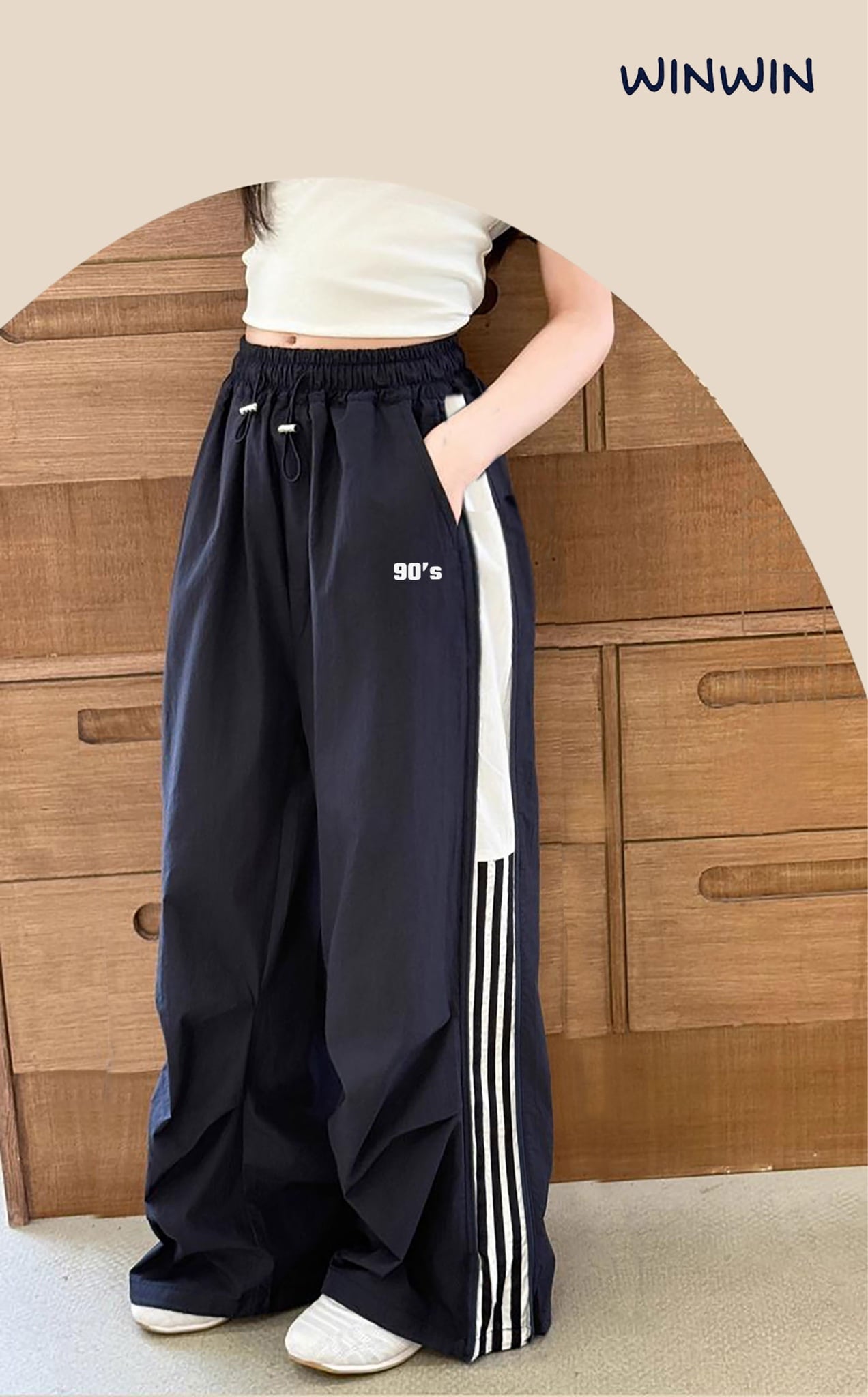 Quần gió WinWin ống suông viền sọc hông bé gái size 6-15y