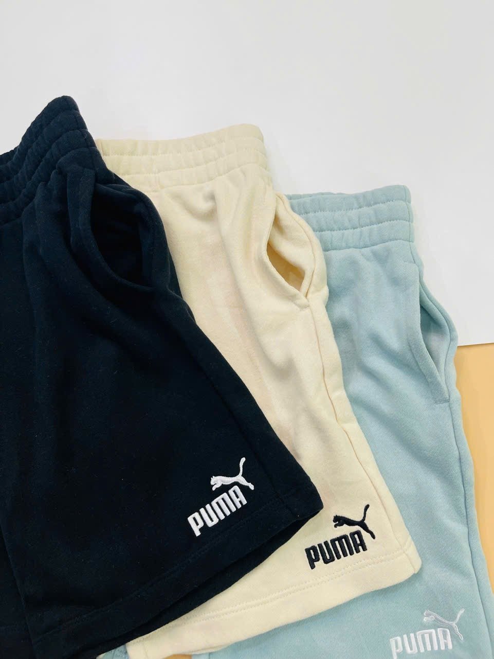 Quần short da cá P.u.m.a dư xịn trơn 3 màu cho bé size 2-16y