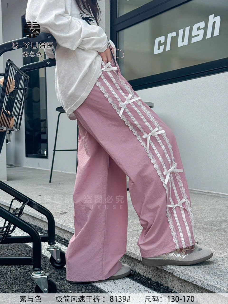 SYS8139 - Quần gió sọc ren nơ màu hồng cho bé size 130-170