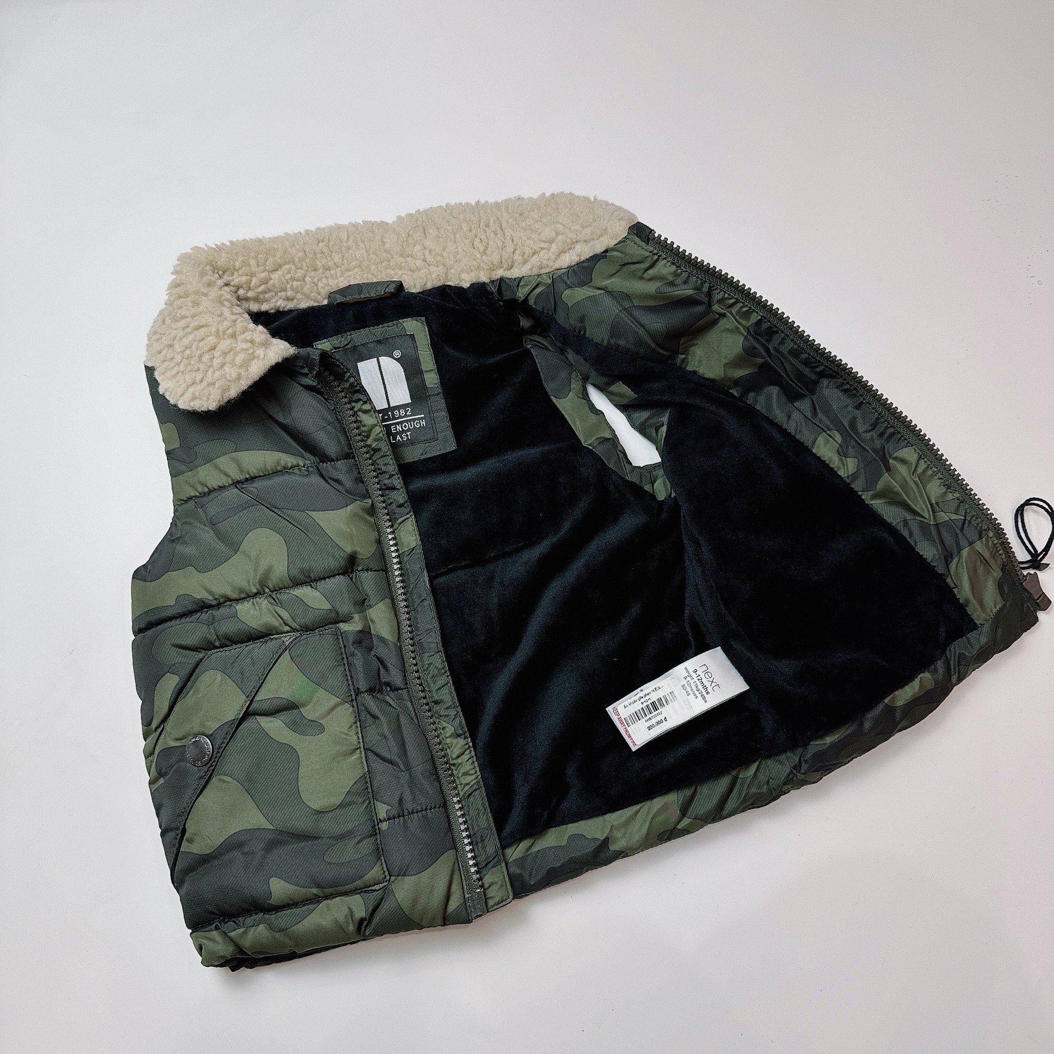 Áo khoác gile phao N.E.X.T zanzi rêu phối cổ lông cừu size 6m - 2y