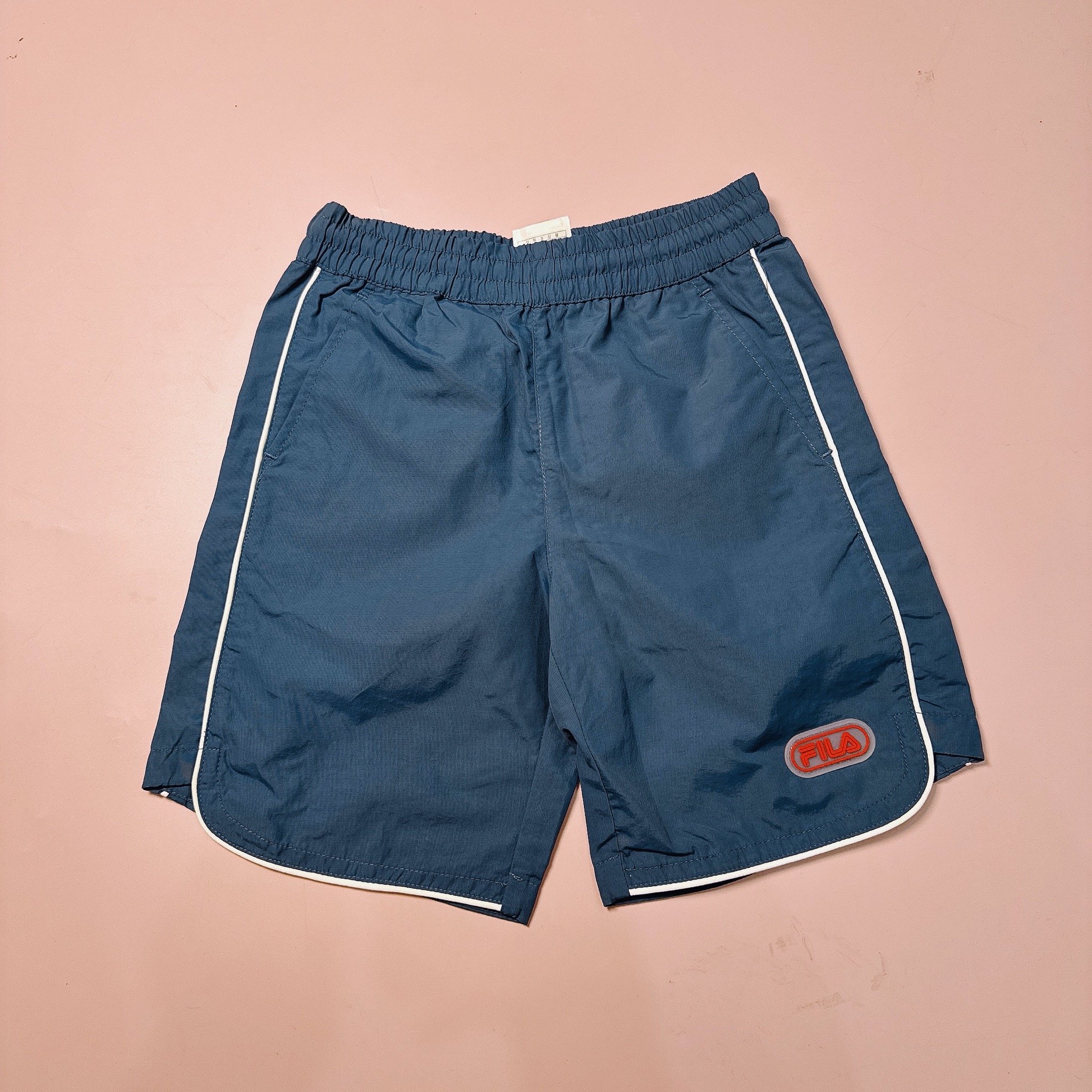 Quần gió đi biển F.i.l.a viền trắng 4 màu BT size 100 - 165