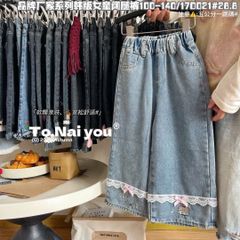 Quần jean QC ống suông gấu ren nơ bé gái size 90-130