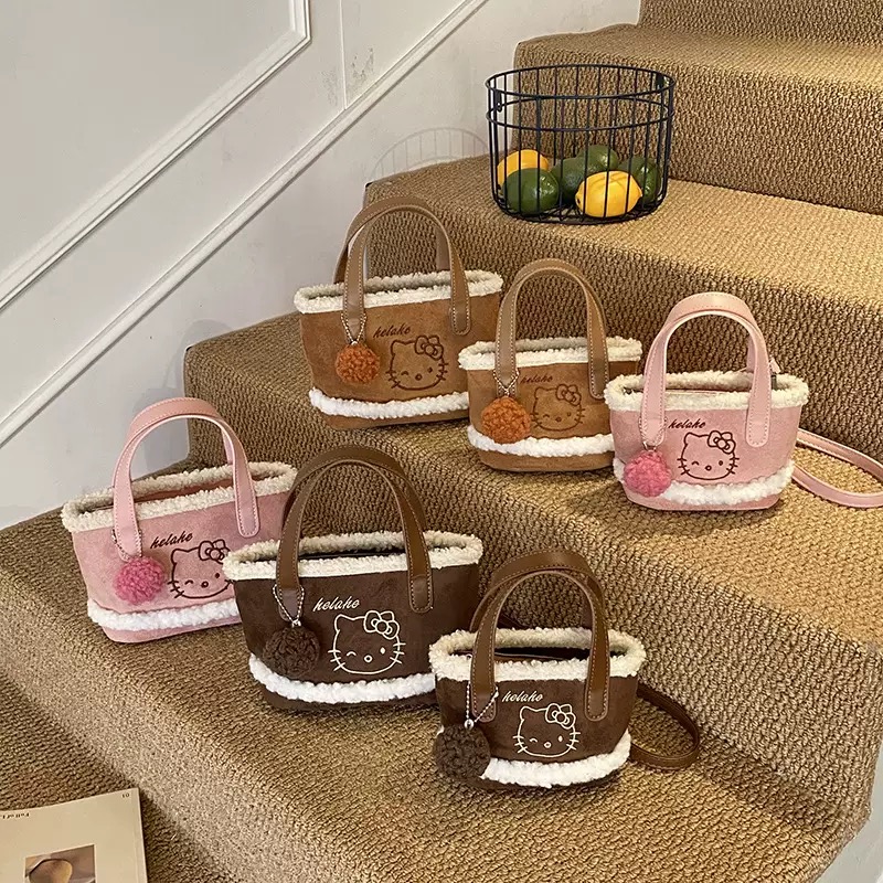 Túi xách đeo chéo da lộn Hello Kitty nhiều màu cho bé