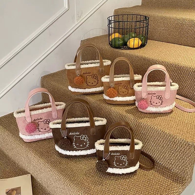 Túi xách đeo chéo da lộn Hello Kitty nhiều màu cho bé