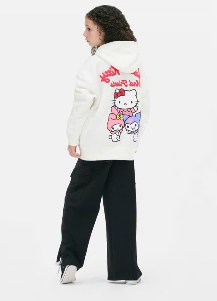 Bộ nỉ bông Primark dòng Đại áo trắng Hello Kitty - quần ống xuông đen size 8 - 15y