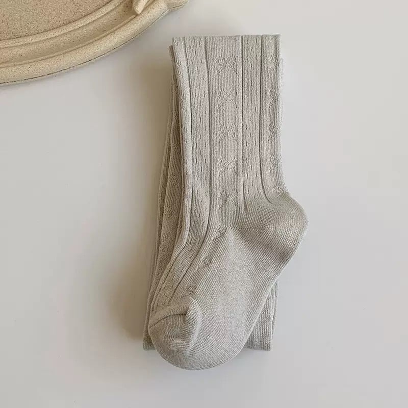 Quần tất trơn họa tiết vân nơ chìm nhiều màu cho bé size 70-140cm